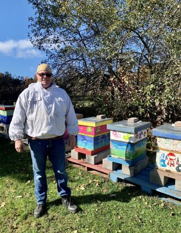 Beekeeper with Hives